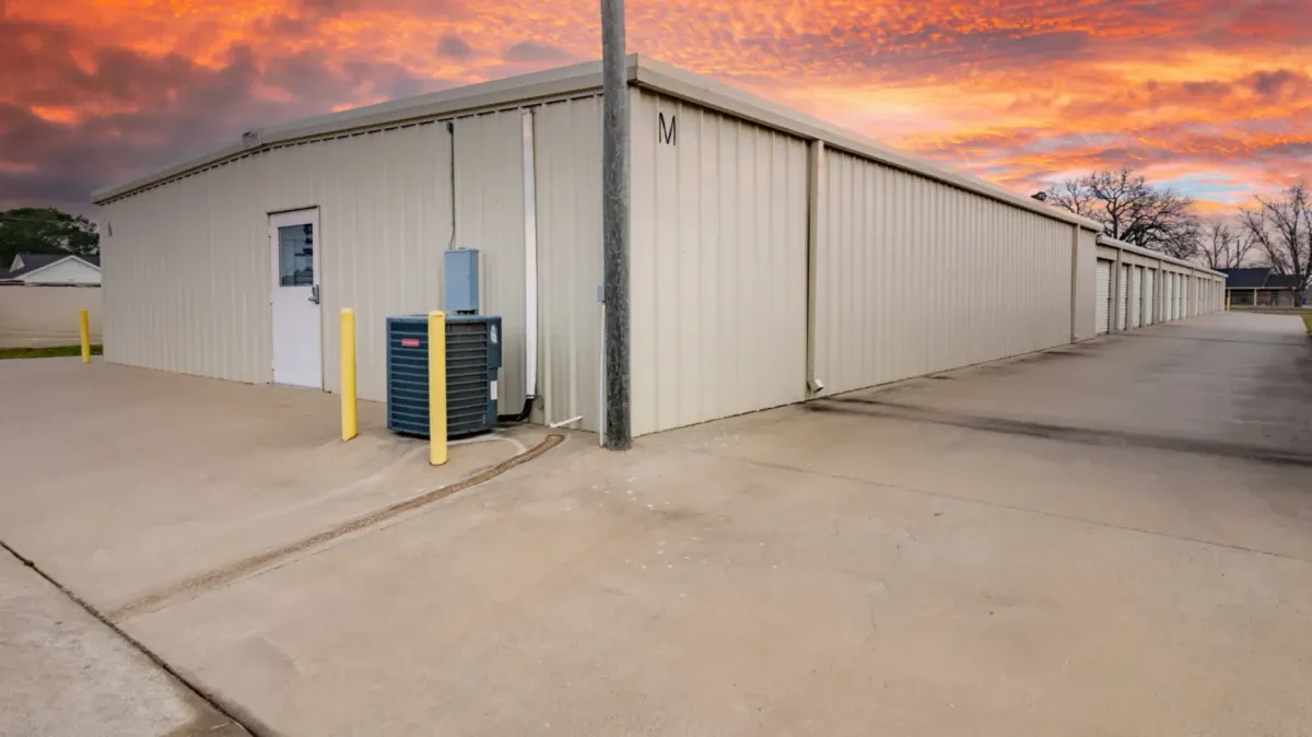 Paved outdoor rollup storage units.