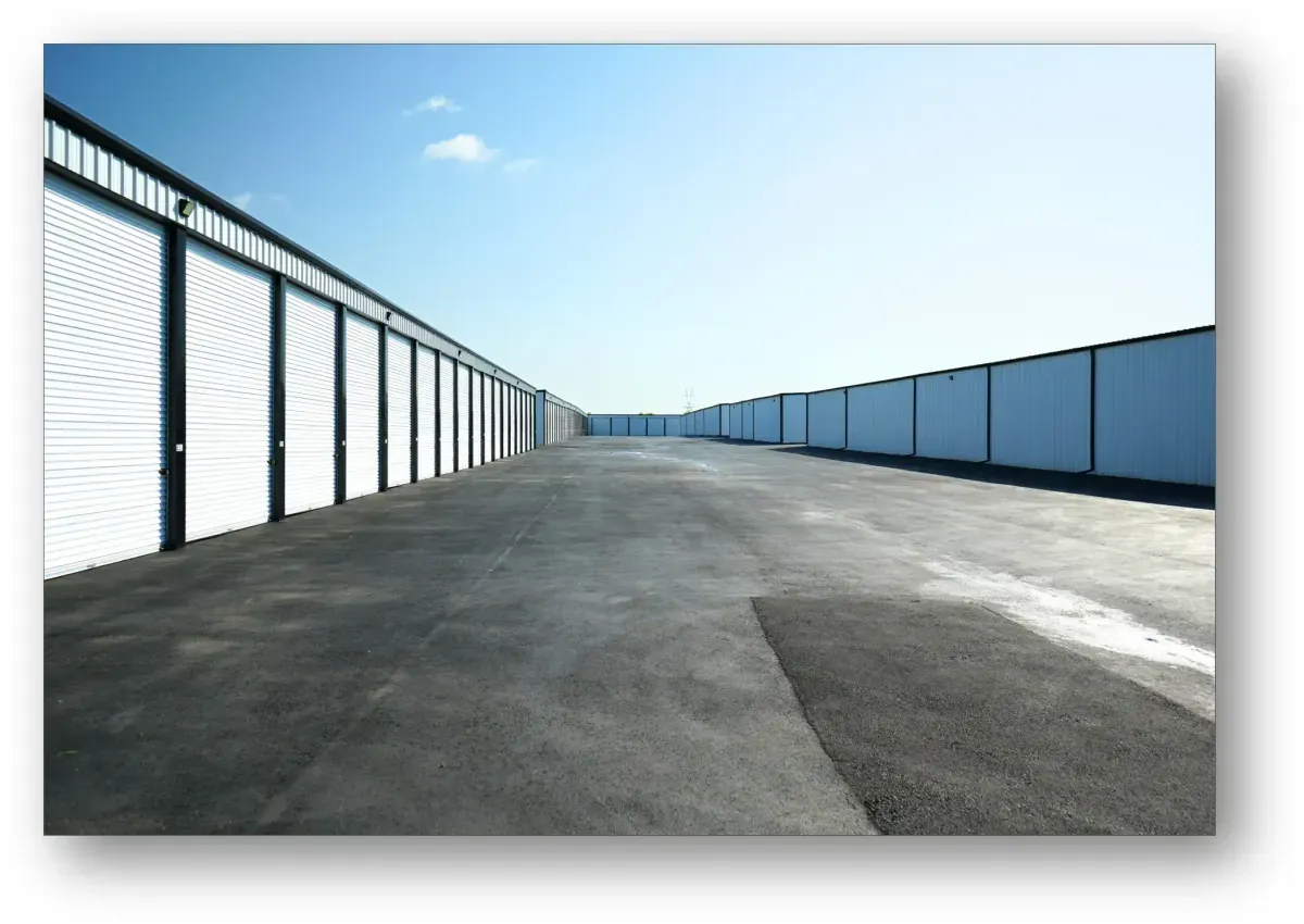 Paved lot with rollup parking spaces.