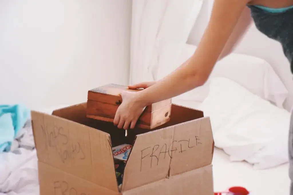Girl packing box